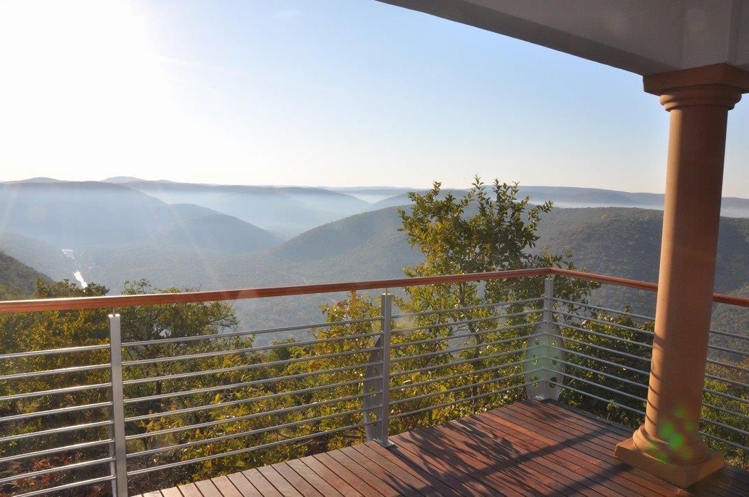 View of the Waterberg valley from a wooden deck at Sable Hills Eco Estate
