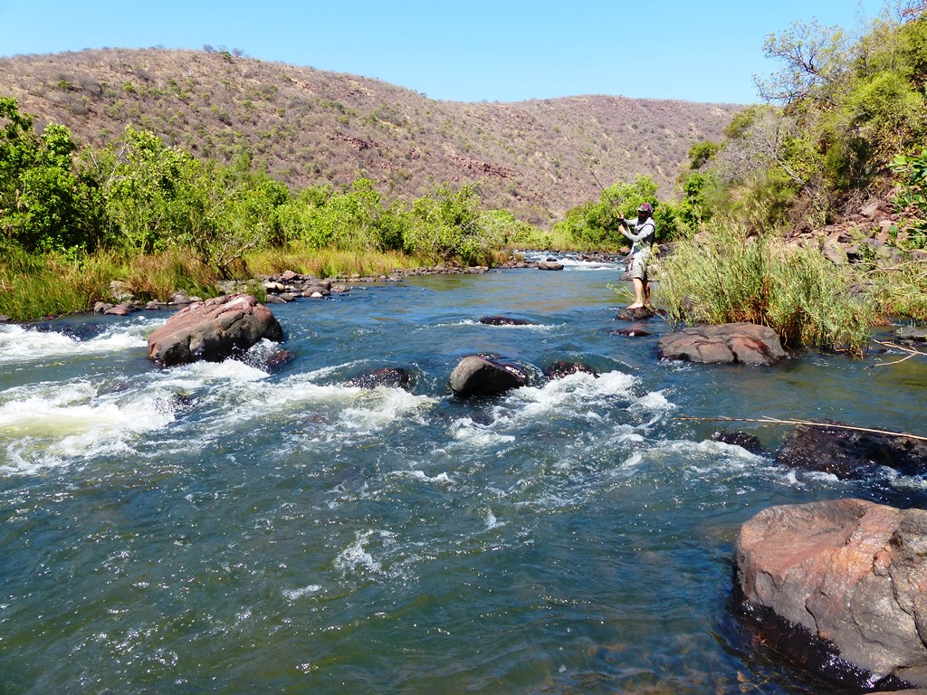 River scene with fly fishing at Sable Hills Eco Estate, Waterberg